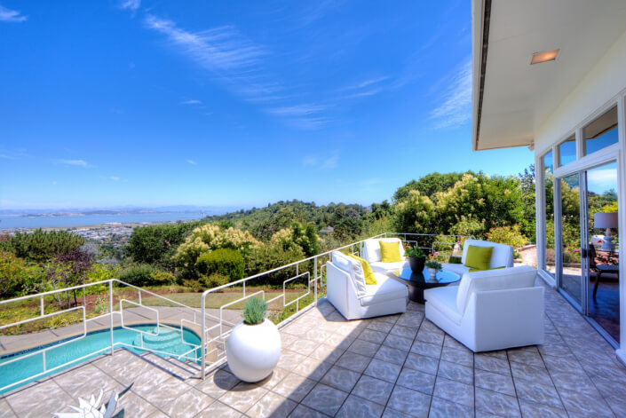 Upper deck area with pool below