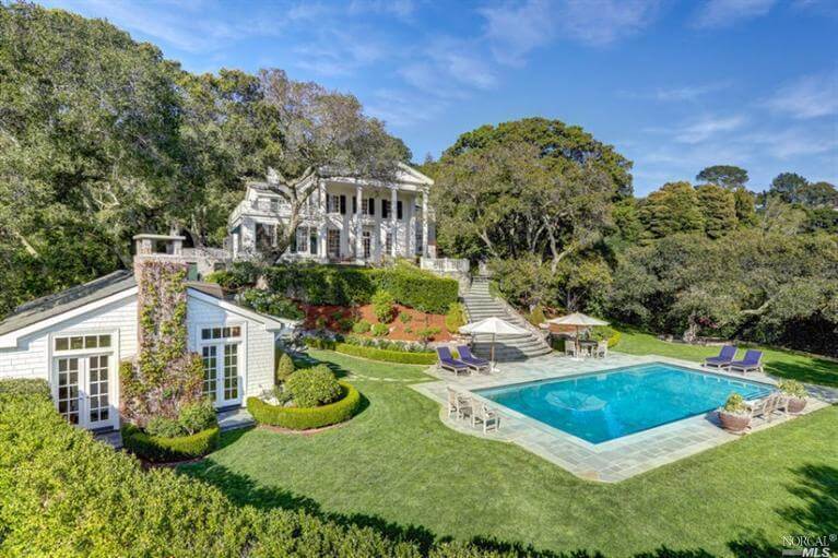 44 Makin Grade Kentfield with swimming pool and umbrellas in foreground on a sunny day