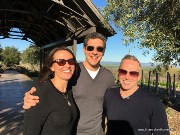 photo of top marin real estate agent thomas henthorne and luca and brenda in front of Ram;'s Gate