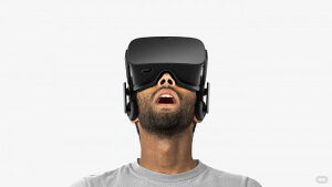 photo of man wearing oculus rift virtual reality headset