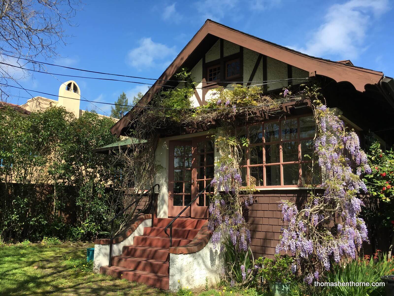photo of gerstle park bungalow with wysteria in bloom