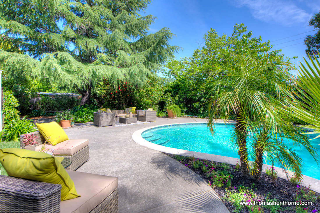 Pool Area With Multiple Seating Options