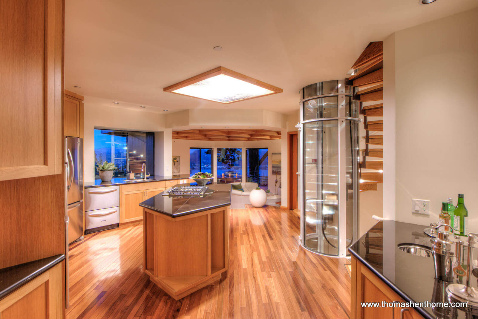 Kitchen view with center island and elevator