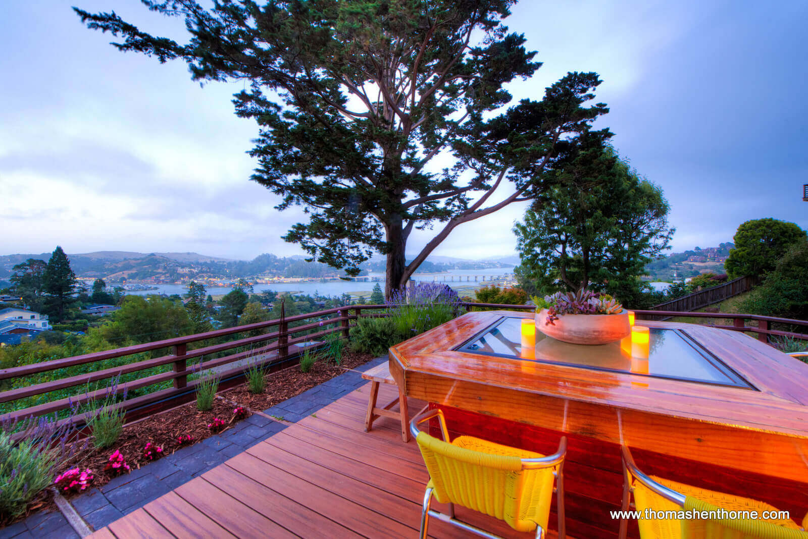 Photo of outdoor table with bay in background