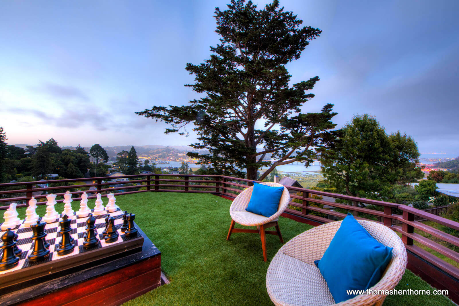 Deck with two chairs and big chessboard