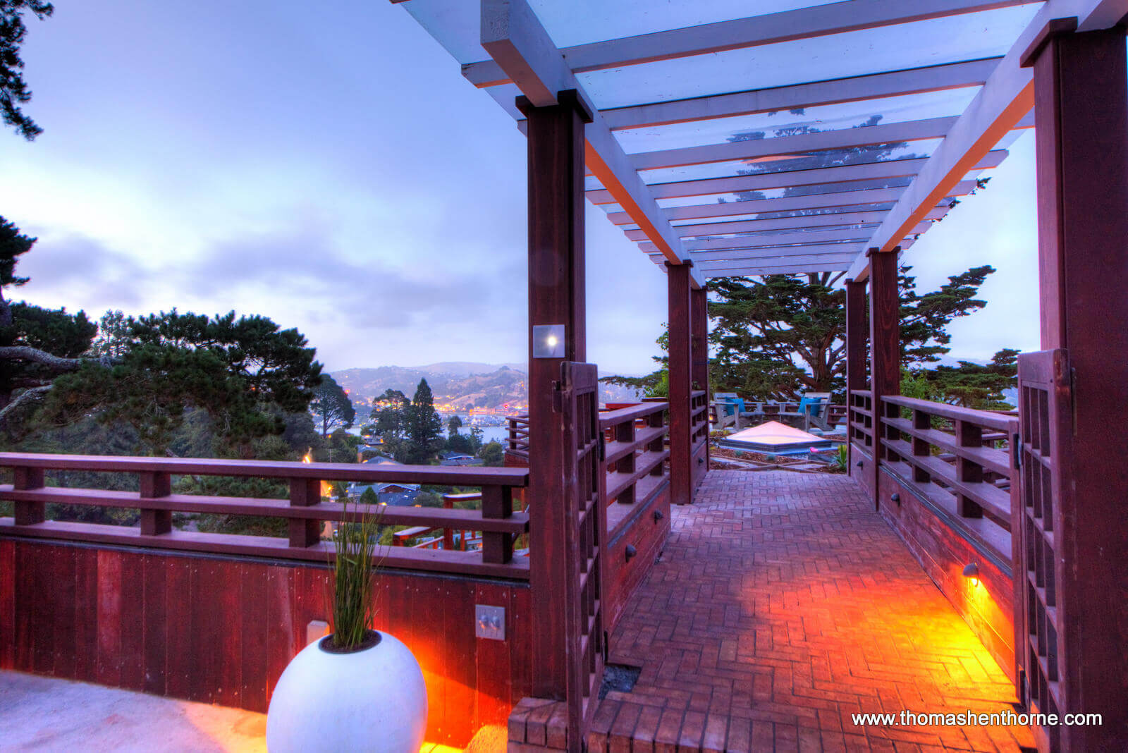 Entry walkway to home at dusk