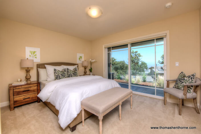 Photo of bedroom #2 with sliding door to exterior yard