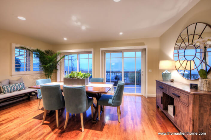 Dining Area with deck and view of bay beyond