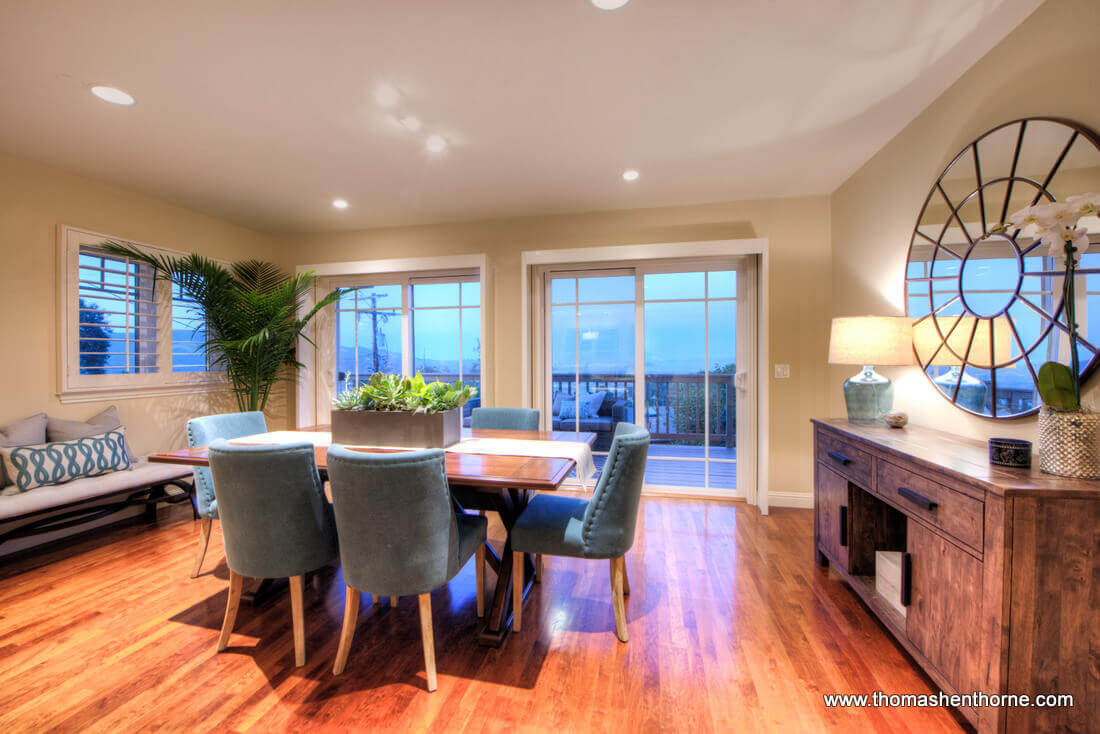 Dining Area with deck and view of bay beyond