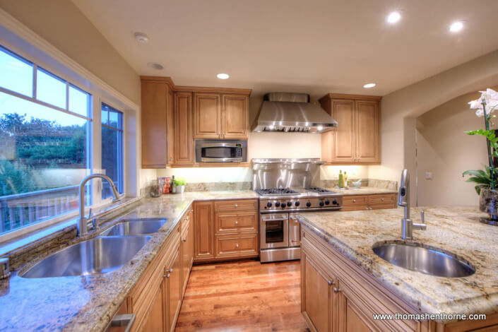 Kitchen with granite counters and stainless appliances