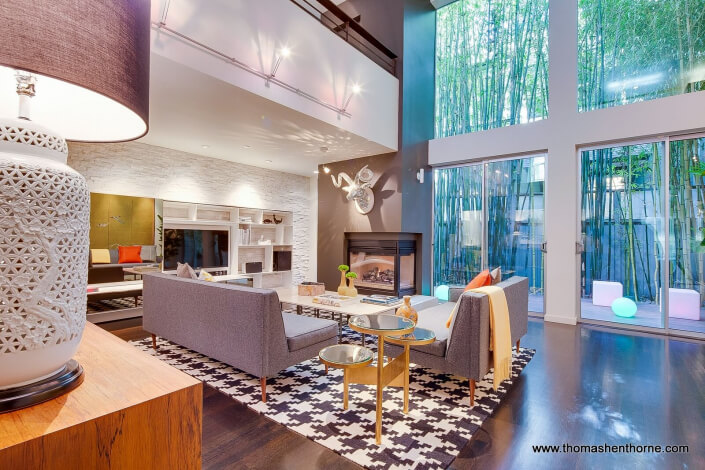 124 Lily Street San Francisco Living Room with fireplace and deck beyond glass doors