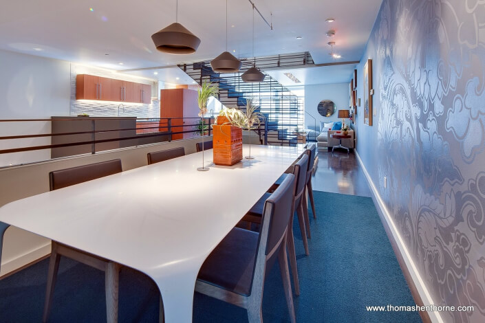 Dining area with view of kitchen and second living room