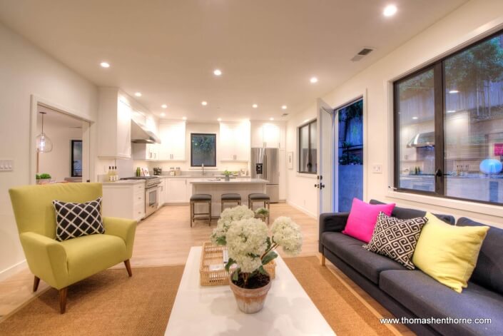 Family room with kitchen in background