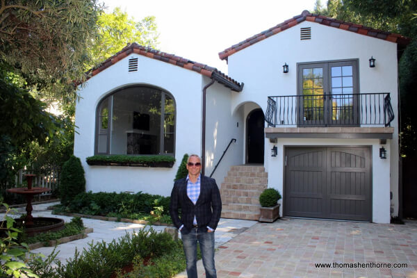 Thomas standing in front of 5 Norwood Avenue in Ross