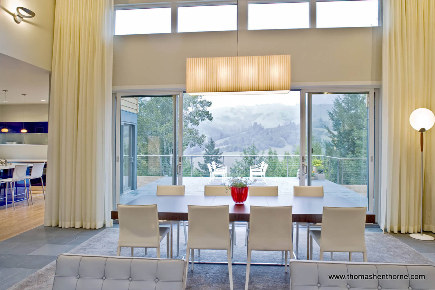 Dining area opens onto patio with gorgeous view