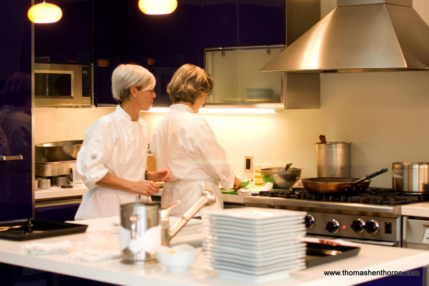 Caterers working in kitchen