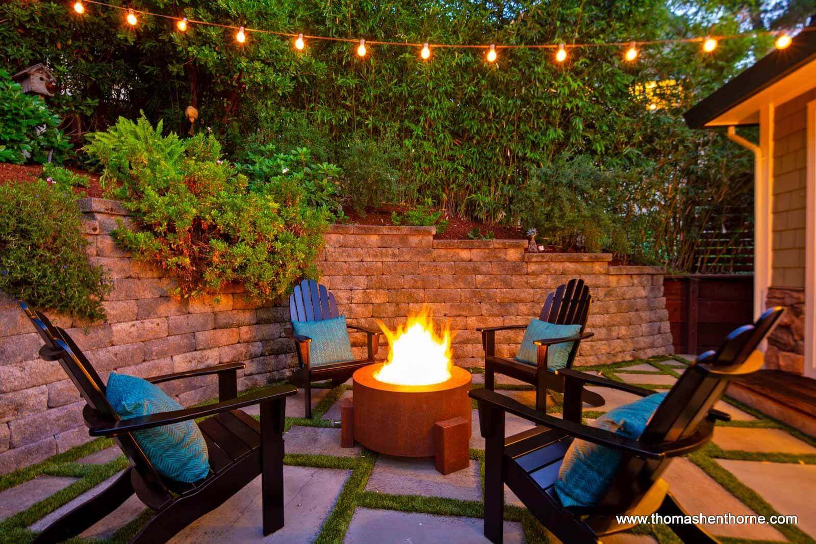 Fire Pit with Adirondack chairs surrounding