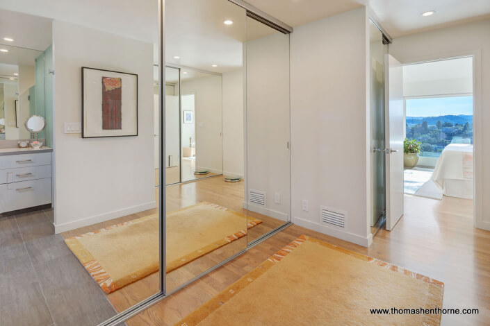 Closets with glass mirror doors