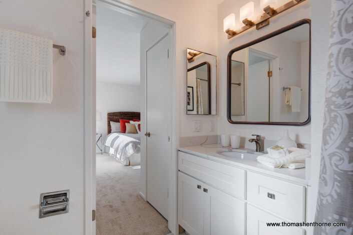 Bathroom with door open to bedroom