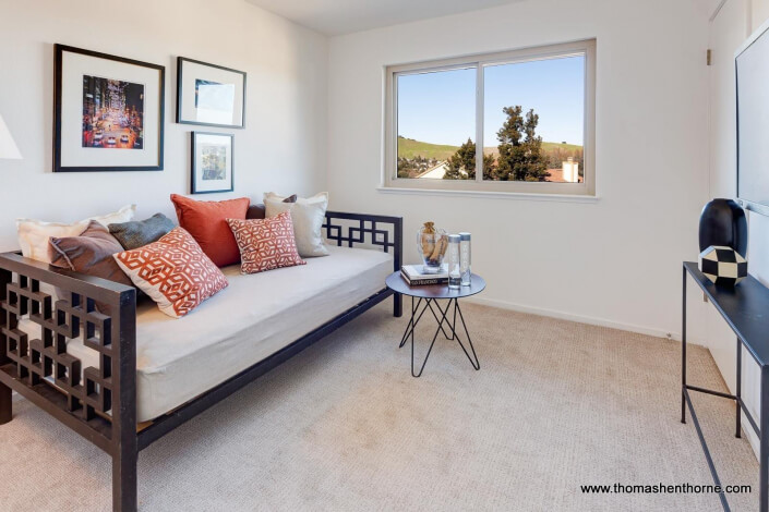 Bedroom with daybed and table