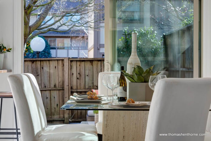 Dining table with open patio doors