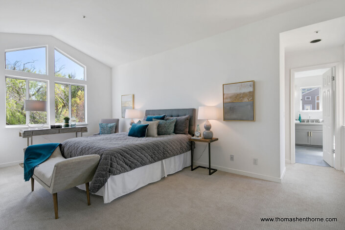 Master bedroom with high ceilings and lots of light