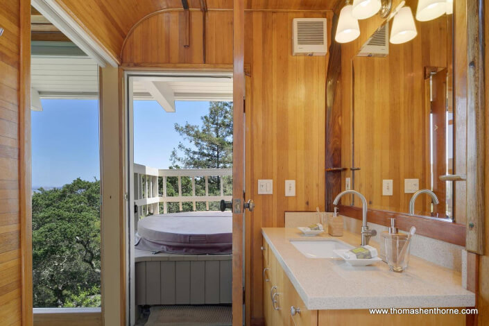 Master bathroom vanity with wood paneling