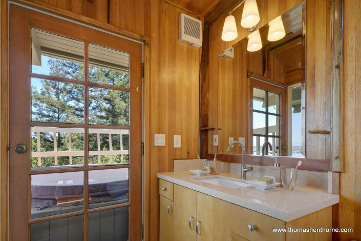 Master vanity with door to hot tub outside