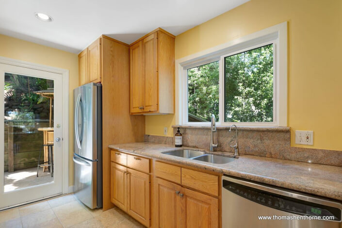 Kitchen with granite counters and stainless appliances