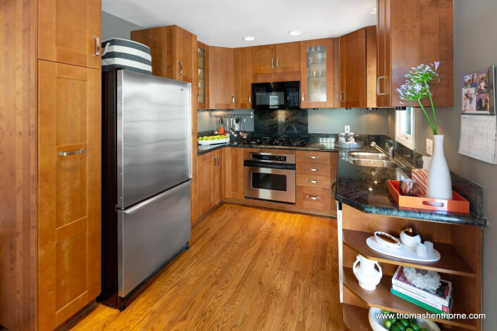 Kitchen with granite countertops and stainless appliances