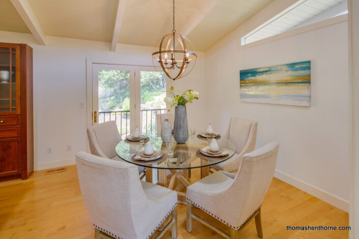 Dining room with glass round table