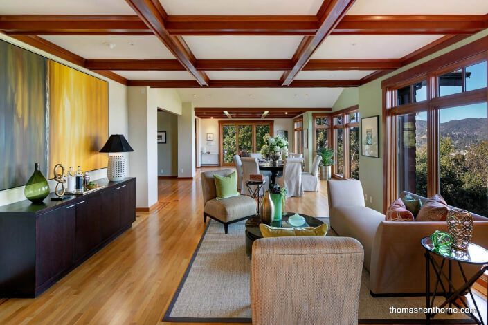 Coffered ceilings in room with hardwood floors