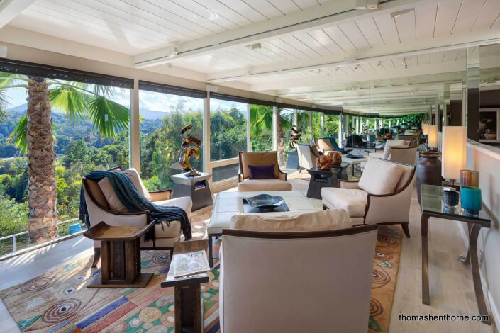 Living room with views of Mt. Tamalpais and open-beam ceilings