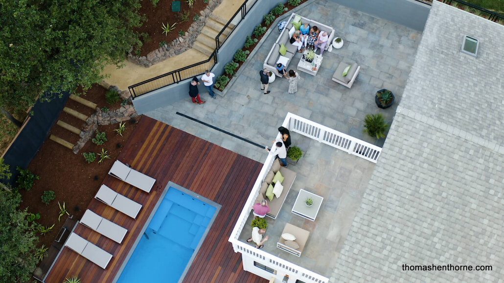 Premiere party aerial shot of home and pool