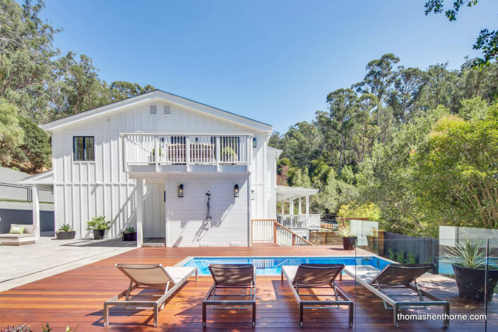 Ipe deck with modern deck chairs and pool