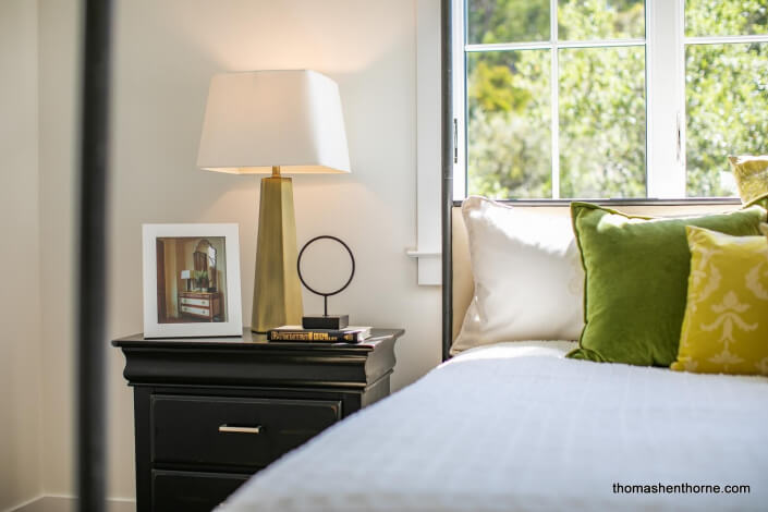 Bed and nightstand with photo and lamp