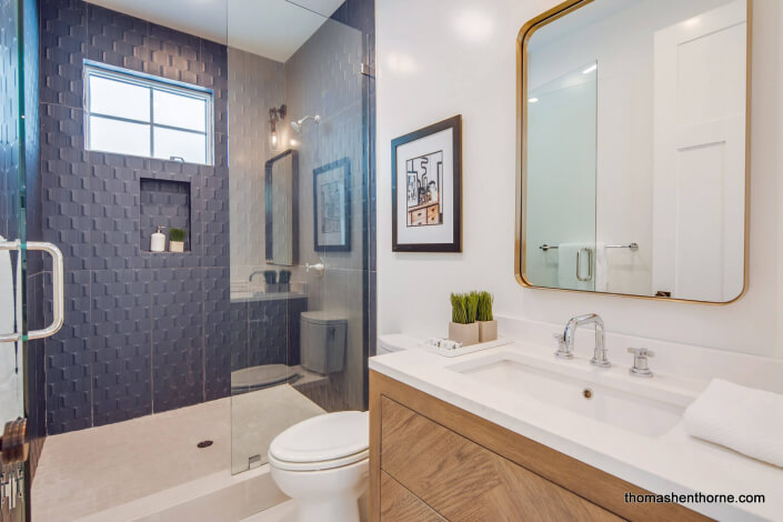 Bathroom with glass shower / tub surround