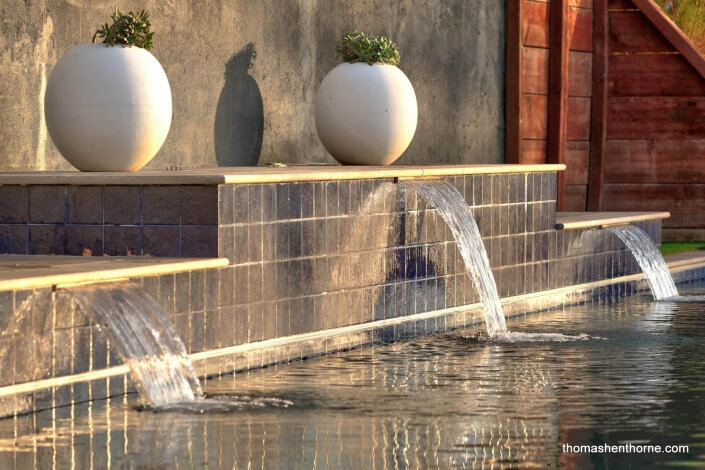 Modern pool with three waterfalls