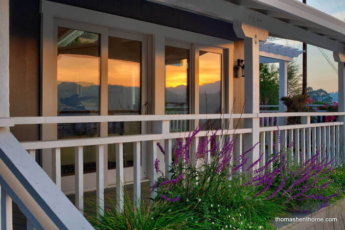 Sunset reflected in home windows