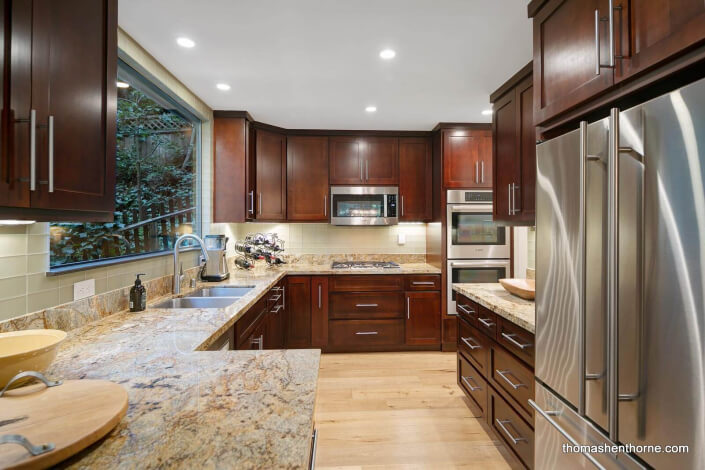 Spacious kitchen with stainless appliances