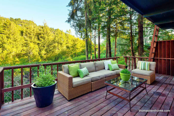 Deck with sofa and chair and coffee table