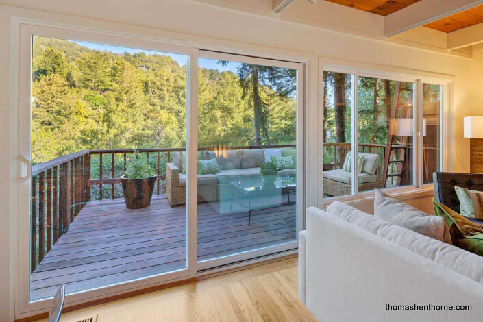 Deck off living room through sliding doors