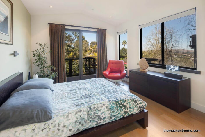 Bedroom with corner windows