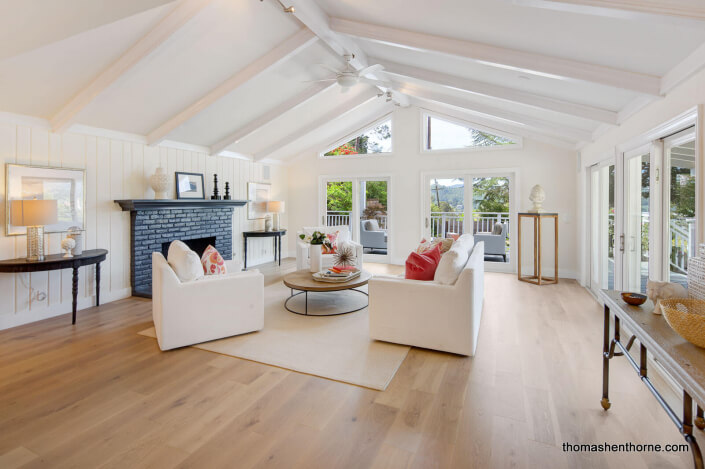 Family room with fireplace and cathedral ceiling