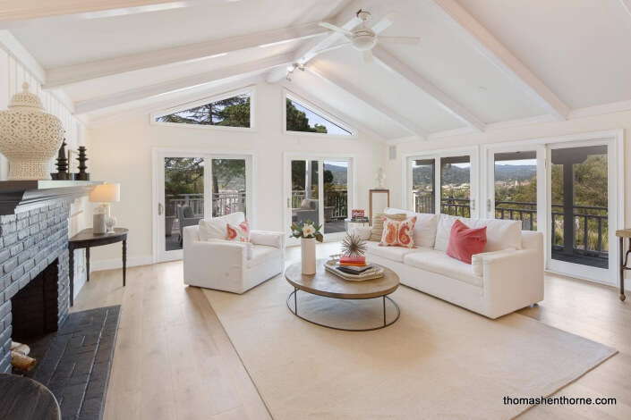 Family room with fireplace and cathedral ceiling