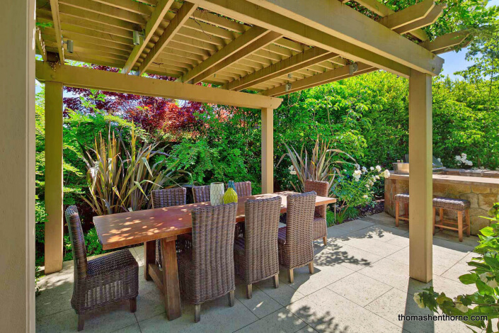 Outdoor Dining Table Under Trellis