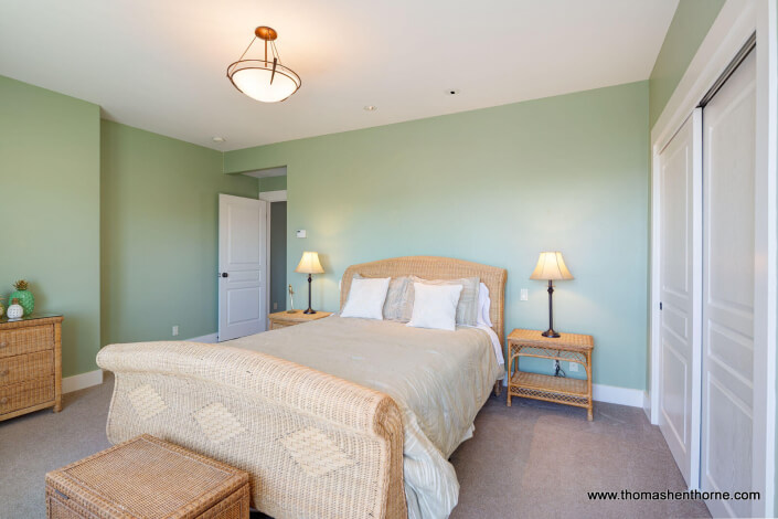 bedroom with wicker bed