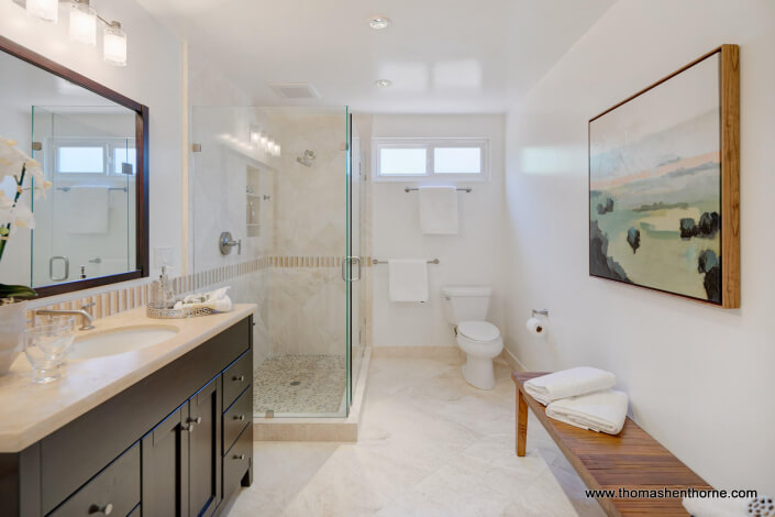 Bathroom with glass shower surround and custom vanity