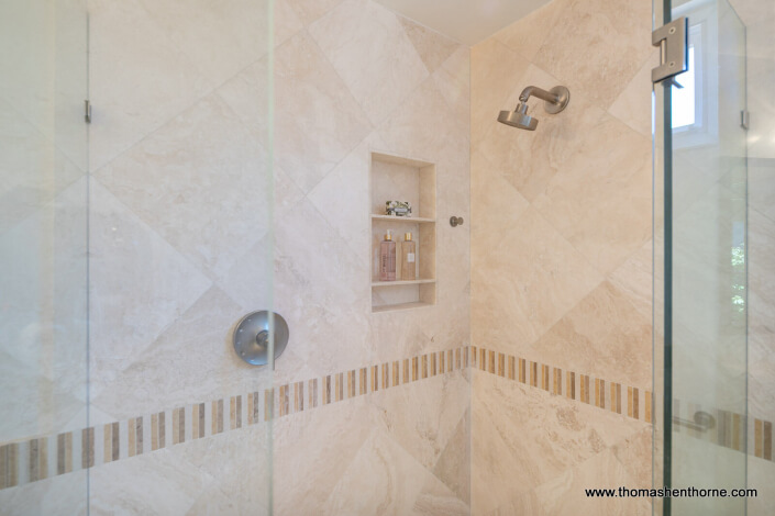 modern shower with tile and glass door