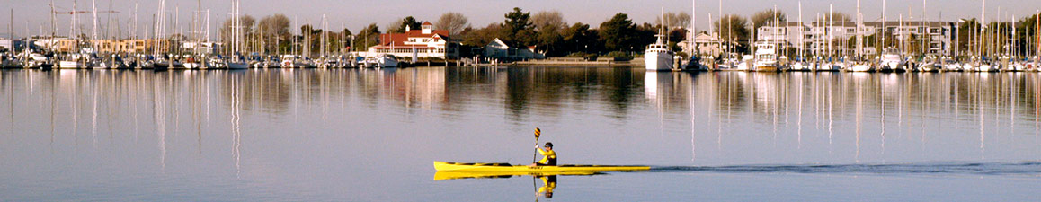 Sea kayak with marina in background